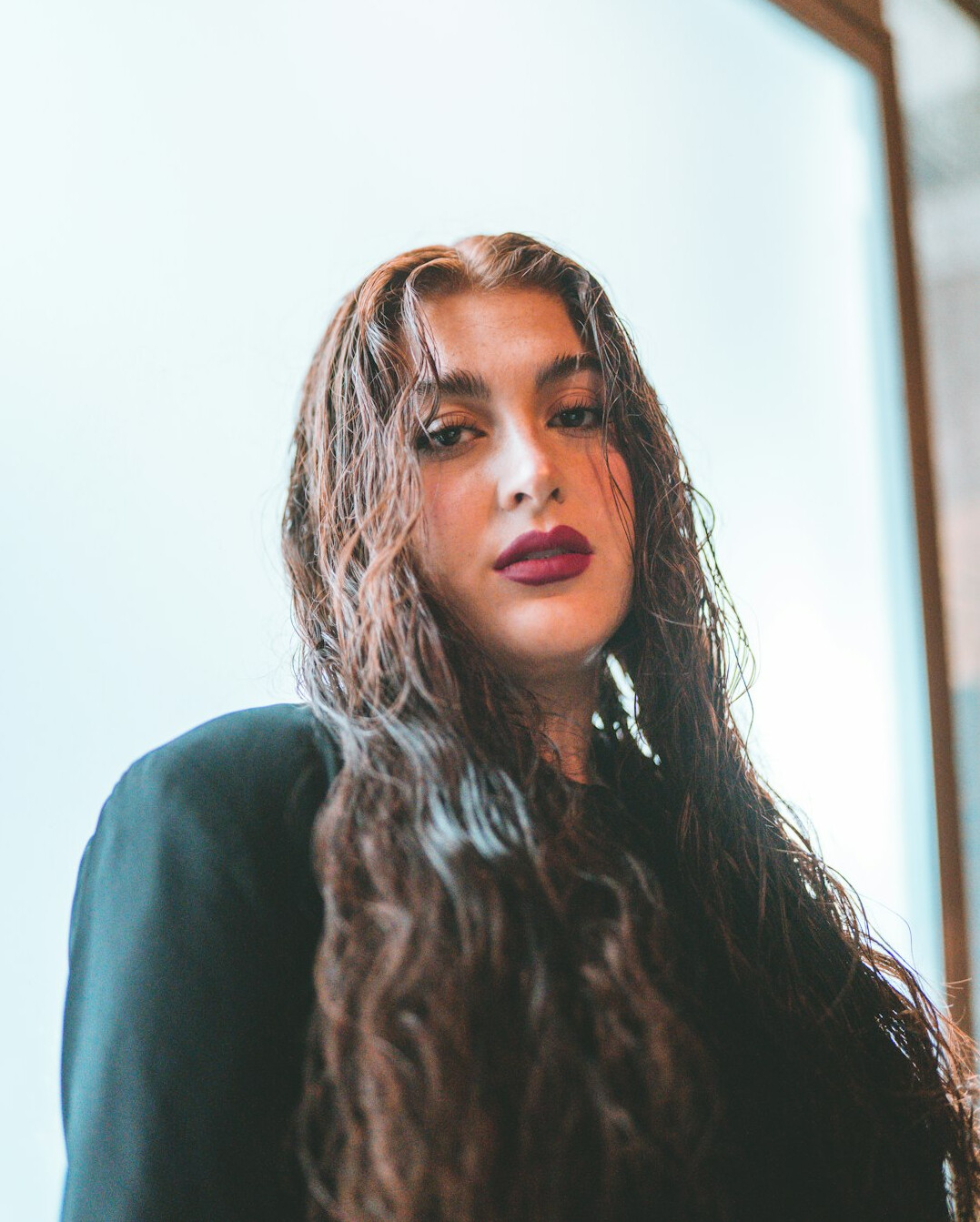 Portrait of a professional woman with curly hair